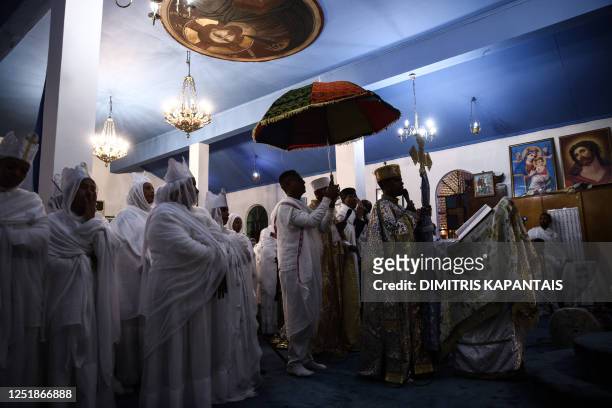 Christian Ethiopians living in Greece attend a midnight Mass on the Eve of the Resurrection of Jesus at the Ethiopian Coptic Church in Athens, Greece...