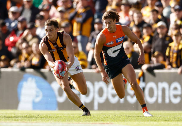 Seamus Mitchell of the Hawks and James Peatling of the Giants in action during the 2023 AFL Round 05 match between the GWS Giants and the Hawthorn...