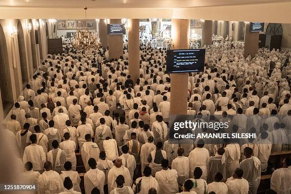 Ethiopian Orthodox devotees pray during the celebration of Easter at