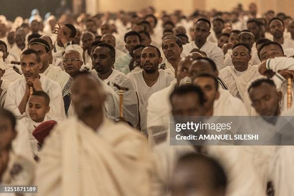 Ethiopian Orthodox devotees pray during the celebration of Easter at