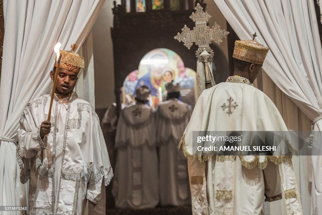 Orthodox deacons pray during the celebration of easter at Bole... News