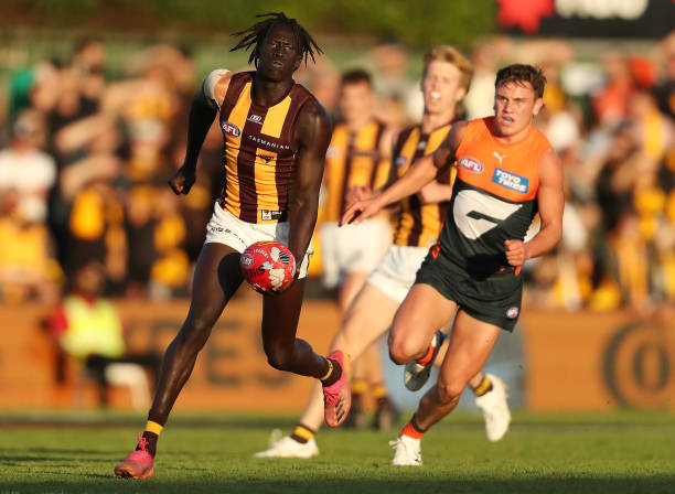 Changkuoth Jiath of the Hawks handpasses the ball during the 2023 AFL Round 05 match between the GWS Giants and the Hawthorn Hawks at Norwood Oval on...