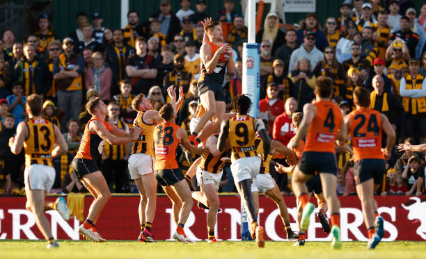 Harry Himmelberg of the Giants takes a spectacular over James Sicily of the Hawks in the dying seconds during the 2023 AFL Round 05 match between the...