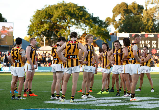 The Hawks look dejected after a loss during the 2023 AFL Round 05 match between the GWS Giants and the Hawthorn Hawks at Norwood Oval on April 16,...
