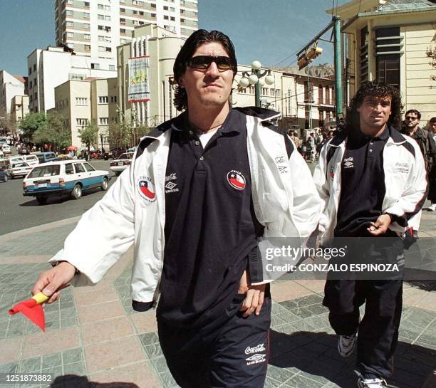 The star of the Chilean select soccer team, Ivan Zamorano walks down a central avenue in La PAz with a Bolivian flag in his hand, 13 July 2000....