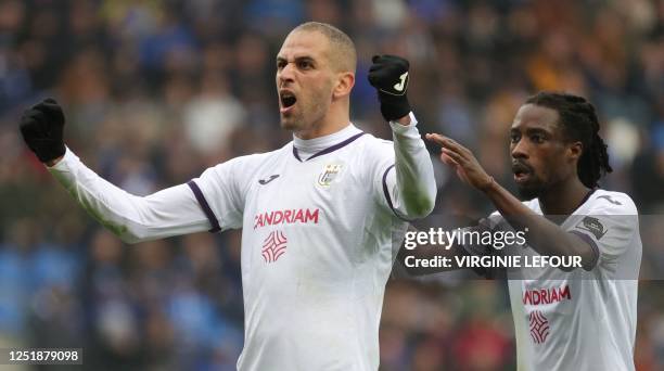 Anderlecht's Algerian forward Islam Slimani celebrates after scoring during the Belgian Pro League football match between KRC Genk and RSC Anderlecht...