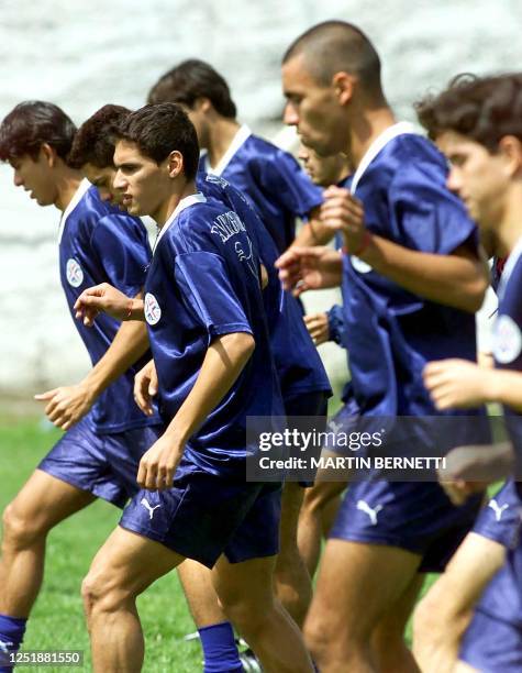 Paraguayan soccer players of the Sub-20 selection warms up in Ambato, Ecuador, 12 January 2001. Paraguayan selection trains for the game of South...