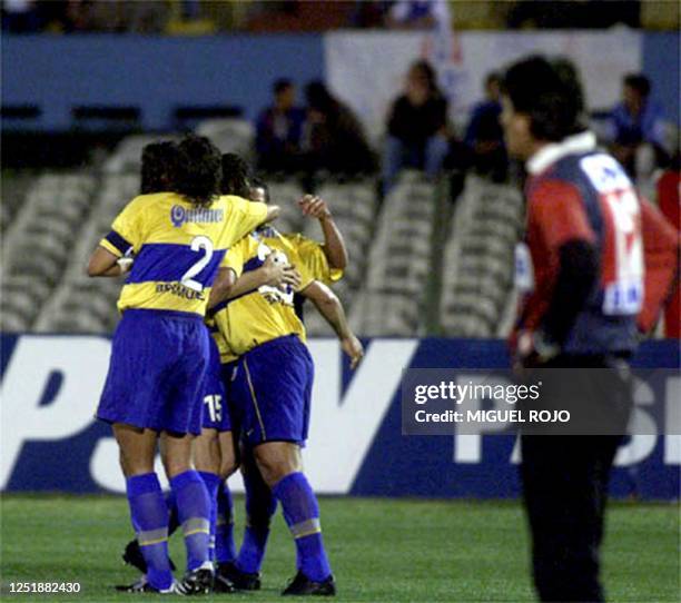 Players of Boca Juniors of Argentina celebrate a second goal for the team, 18 October 2000, against the Uruguayan National team, in a game for the...