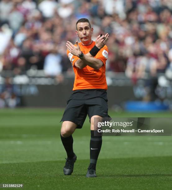 Referee David Coote during the Premier League match between West Ham United and Arsenal FC at London Stadium on April 16, 2023 in London, United...