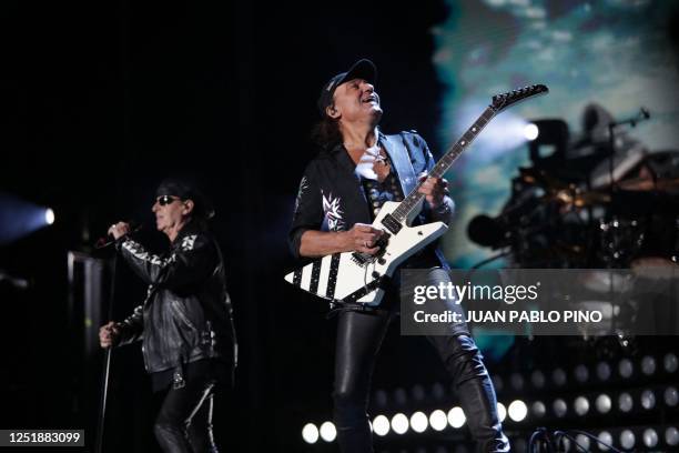 Klaus Meine and Matthias Jabs, members of the German band Scorpions, perform onstage during the Monsters of Rock Fest in Bogota on April 15, 2023.