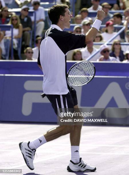 Tim Henman of Great Britain reacts after defeating Brazilian player Gustavo Kuerten in the tie breaker of the third set on 12 August, 2000 at the...