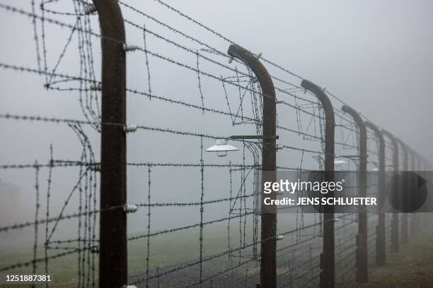 Barbed wire fence encloses the memorial site of the former Nazi concentration camp Buchenwald prior to the commemoration ceremony to mark the 78th...