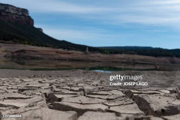 This photograph taken on April 16, 2023 shows a general view of the low water-level and the dried banks of the swamp of Sau, located in the province...