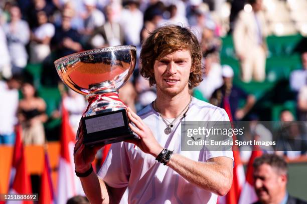 Monte-Carlo Masters winner Andrey Rublev rises the Champion trophy after defeating Holger Rune of Denmark during day eight of the Rolex Monte-Carlo...