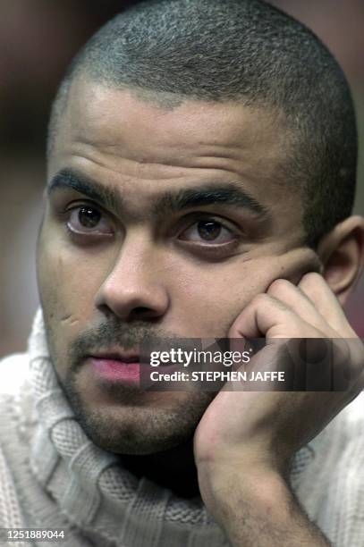 San Antonio Spur's Tony Parker of France, who recently hurt his ankle, watches basketball action as his team plays the Washington Wizards at the MCI...