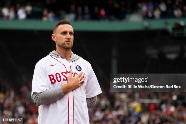 Former Boston Red Sox player Will Middlebrooks is introduced during a pre-game ceremony in recognition of the 10 year anniversary of the 2013 World...