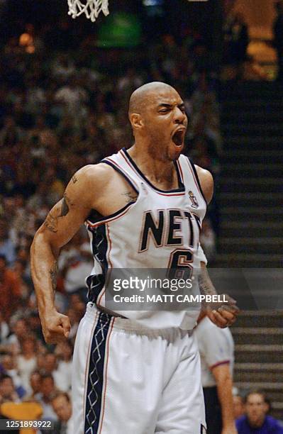 New Jersey Nets' Kenyon Martin reacts after dunking the ball during third quarter action in game three of the NBA Finals against the Los Angeles...