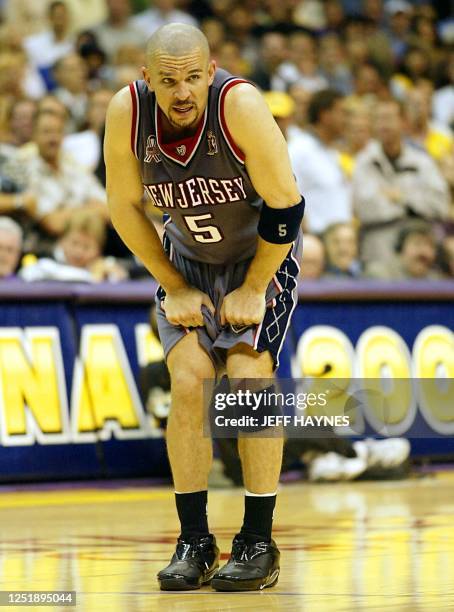 Jason Kidd of the New Jersey Nets pulls on his shorts during game one of the NBA Finals against the Los Angeles Lakers 05 June 2002, at the Stapes...