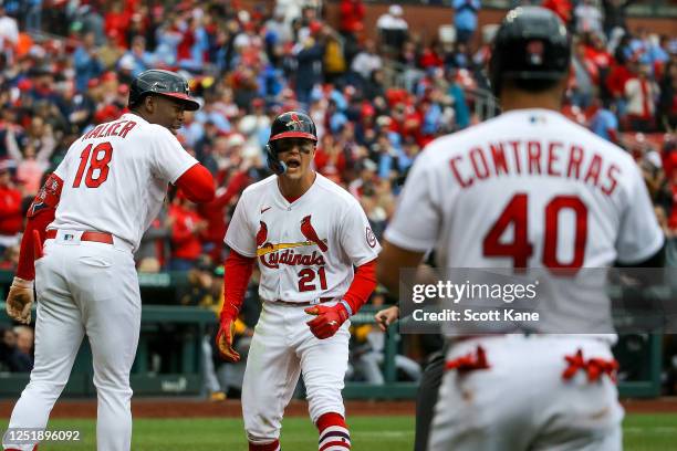 Lars Nootbaar of the St. Louis Cardinals reacts as he is congratulated by Jordan Walker after hitting a two-run home run during the sixth inning...