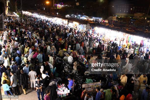 Pakistani people do shopping ahead of Eid Al-Fitr in Karachi, Pakistan, on April 16, 2023. Muslims around the world celebrate Eid al-Fitr, the three...