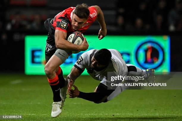 Toulouse's French fullback Melvyn Jaminet runs with the ball during the French Top14 rugby union match between Stade Toulousain Rugby and Lyon...