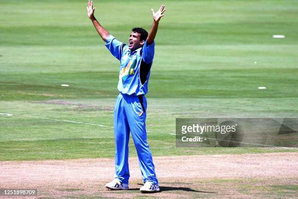 India's Zaheer Khan celebrates taking the wicket of Chris Harris for 17 runs in the ICC Cricket World Cup 2003 game between India and New Zealand at...