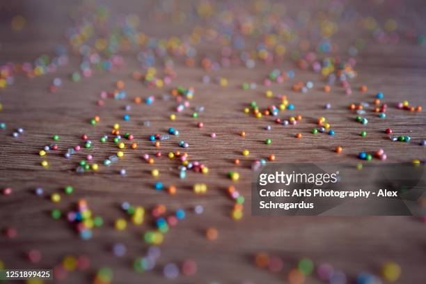 home baking sprinkles - rainbow confetti stock pictures, royalty-free photos & images