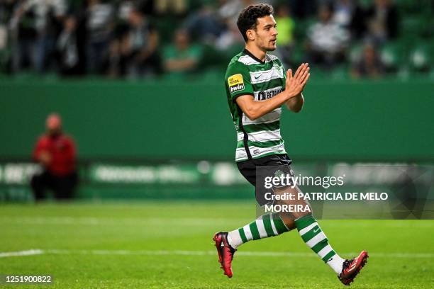 Sporting Lisbon's Portuguese midfielder Pedro Goncalves celebrates after scoring his team's first goal during the Portuguese league football match...