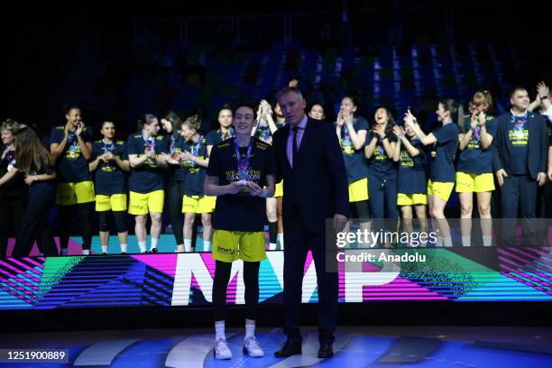 Breanna Stewart of Fenerbahce Alagoz Holding holds the MVP award as players of Fenerbahce Alagoz Holding celebrate their victory at the end of the...