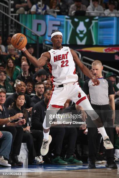 Jimmy Butler of the Miami Heat passes the ball during the game against the Milwaukee Bucks during Round One Game One of the 2023 NBA Playoffs on...