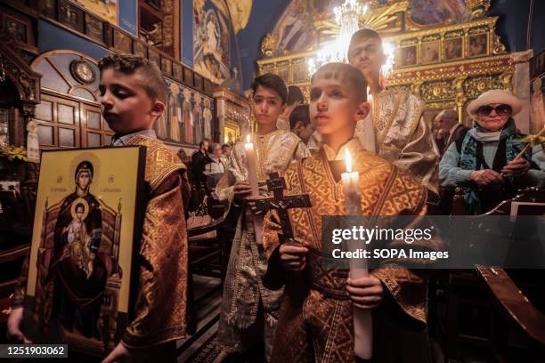 Palestinian Christians attend the Orthodox Christian Easter service at the Church of Saint Porphyrios Orthodox Church in Gaza City.