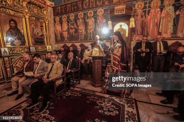 The Patriarchal Representative for the Greek Orthodox in the Gaza Strip leads the celebration as the Holy Fire arrives at the Church of Saint...