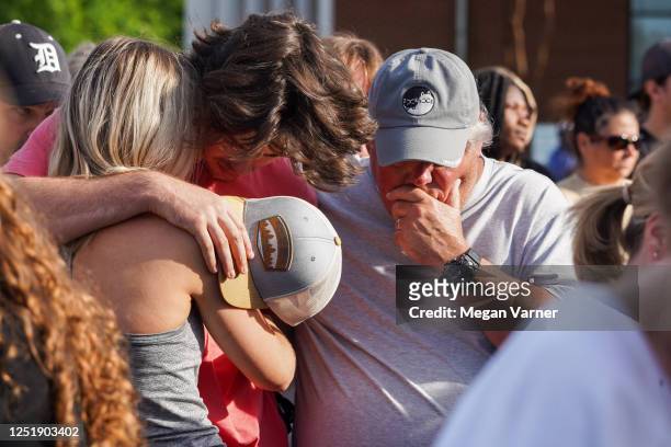 Mourners attend a vigil at the First Baptist Church of Dadeville following last night's mass shooting at the Mahogany Masterpiece dance studio on...