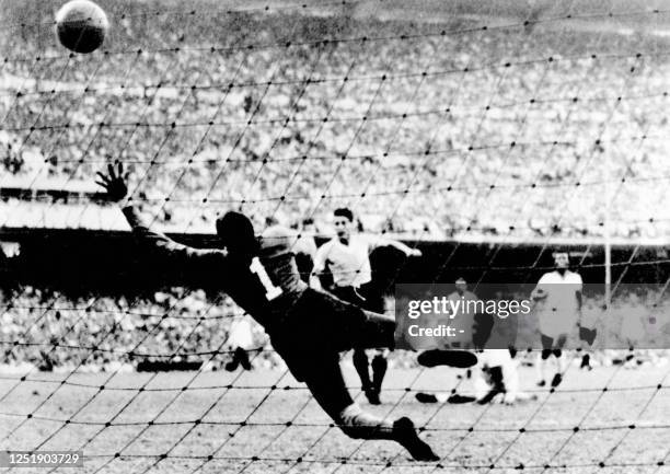 File photo taken 16 July 1950 at the Maracana stadium in Rio de Janeiro, when Uruguayan Juan Alberto Schiaffino scores the first goal of his team...