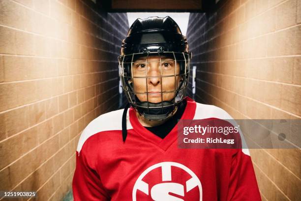 woman hockey player on the ice - england hockey women stock pictures, royalty-free photos & images