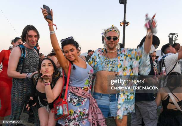 Rosalia's fans dance during her prformance on the first week-end of the Coachella Valley Music and Arts Festival, in Indio, California, on April 15,...