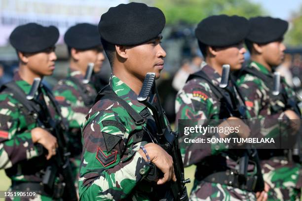 Indonesian police officer attend a security preparation for Eid Al-Ftr in Denpasar, on Indonesia's resort island of Bali on April 17, 2023.