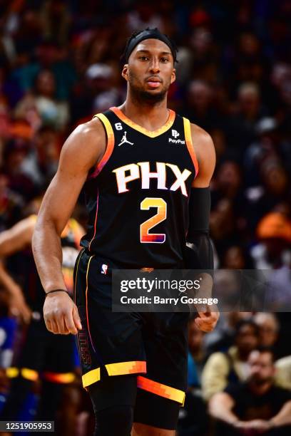 Josh Okogie of the Phoenix Suns looks on during the game During round one game one of the 2023 NBA Playoffs on April 16, 2023 at Footprint Center in...