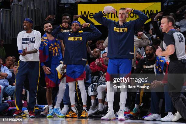 The Denver Nuggets celebrates during Round One Game One of the 2023 NBA Playoffs against the Minnesota Timberwolves on April 16, 2023 at the Ball...