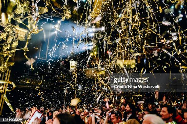 Confetti falls above the audience at the closing performance of "Phantom of the Opera" held at Majestic Theatre on April 16, 2023 in New York City.