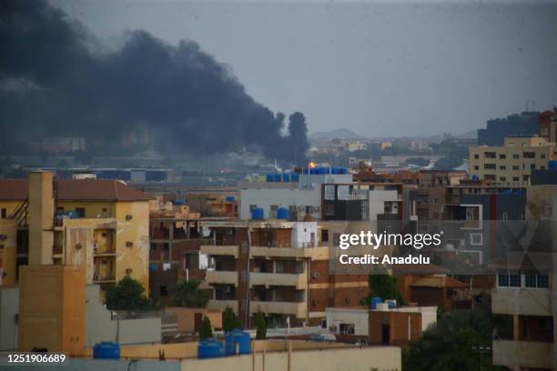 Smoke rises as clashes continue in the Sudanese capital on April 17, 2023 between the Sudanese Armed Forces and the paramilitary Rapid Support Forces...