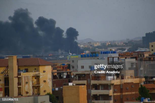 Smoke rises as clashes continue in the Sudanese capital on April 17, 2023 between the Sudanese Armed Forces and the paramilitary Rapid Support Forces...