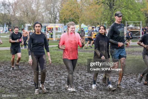 Participants take part in Tough Mudder race in Finsbury Park, London. Tough Mudder was co-founded by Will Dean and Guy Livingstone and the race...