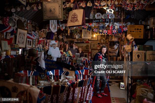 Ardent monarchist Anita Atkinson stands amongst her 13,283 pieces of royal memorabilia which she displays at her Weardale farm near Bishop Auckland,...