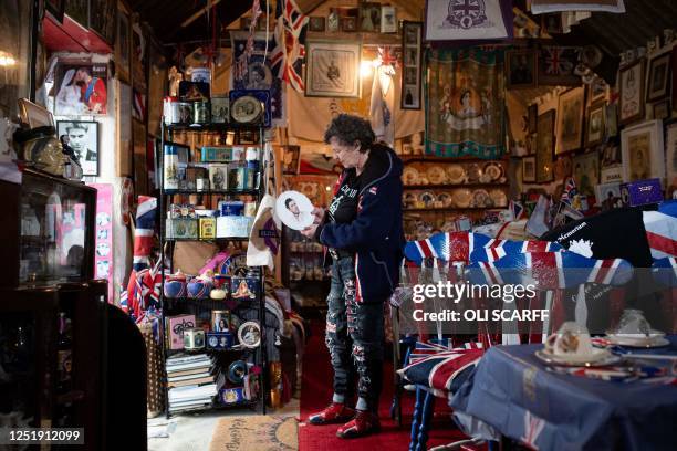 Ardent monarchist Anita Atkinson inspects some of her 13,283 pieces of royal memorabilia which she displays at her Weardale farm near Bishop...