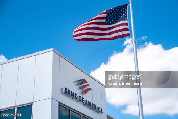 An American flag outside a Bank of America branch in Austin, Texas, US, on Tuesday, April 11, 2022. Bank of America Corp. Is scheduled to release...
