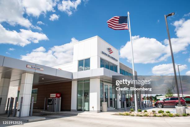 An American flag outside a Bank of America branch in Austin, Texas, US, on Tuesday, April 11, 2022. Bank of America Corp. Is scheduled to release...