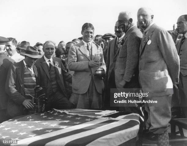 The British Open, Lytham St Annes. The American amateur golfer Bobby Jones collects the first of his three Open titles, after winning with a score of...