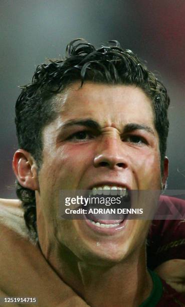 Portuguese forward Cristiano Ronaldo reacts after scoring the winning penalty against England in the quarter-final game for the World Cup 2006 in...