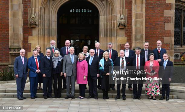 Senator George Mitchell , Heather MacLachlan, Bill Clinton, Hillary Clinton and Bertie Ahern pose alongside other invited delegates and peace workers...